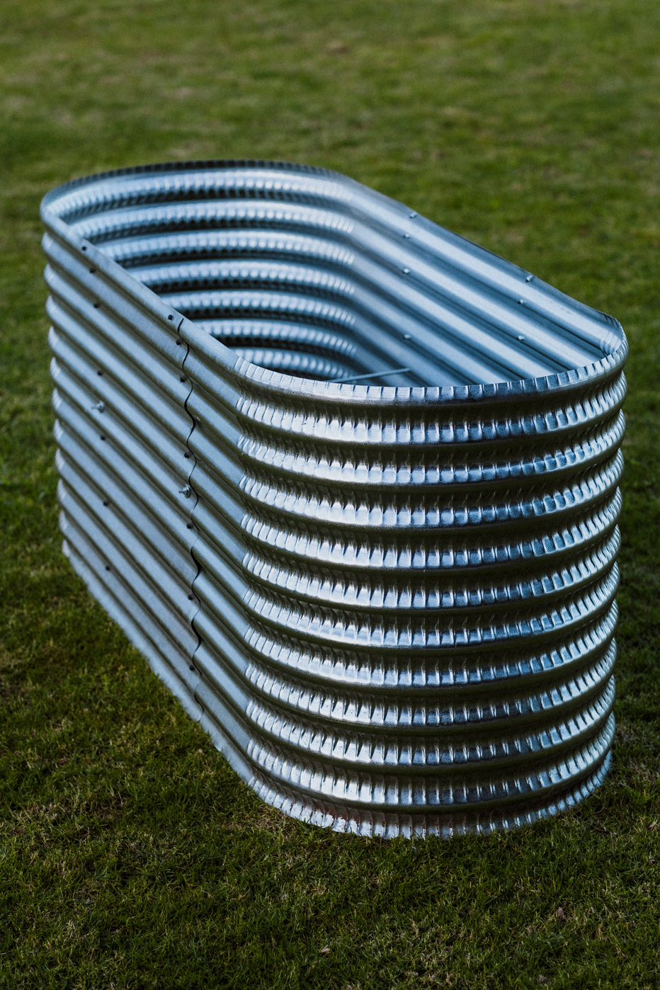 A Plaaslik corrugated steel raised garden bed set up on a balcony